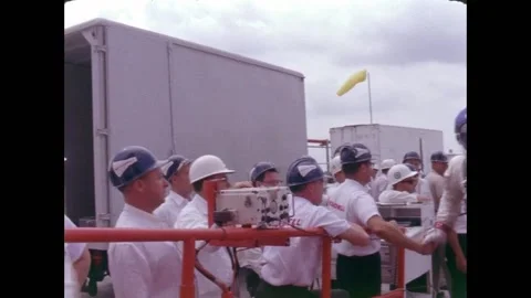 Gemini 9 crew Thomas P. Stafford and Eugene Cernan and arriving at launchpad Stock Footage 263445075