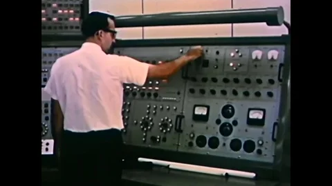 The Gemini mission simulators are computer driven and controlled by an Stock Footage