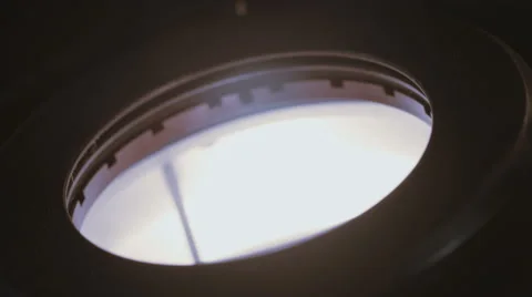 Gemologist inspecting a diamond under a microscope Stock Footage 65257837