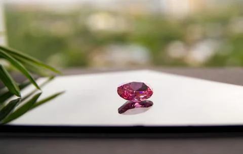Gemstone on glass in reflection 写真素材