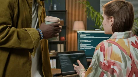 Gen Z Colleagues Programming Code on Digital Devices Stock Footage 302889511