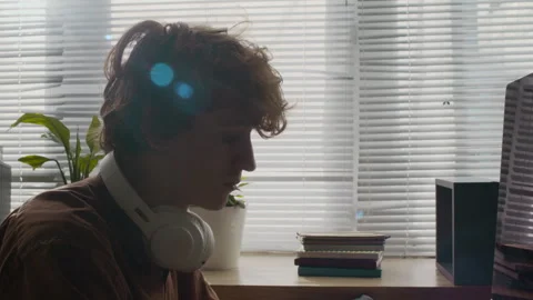 Gen Z Male Programmer Coding on Computer during Workday in Office Stock Footage 299210965