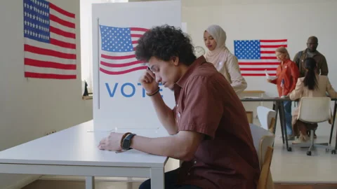 Gen Z Man Voting at Pooling Station on Election Day Video stock 279184134