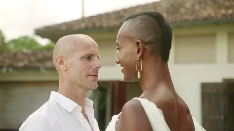 Gender fluid bride dancing on same-sex marriage wedding with groom. Biethnic Video stock 252070526