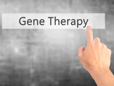 Gene Therapy - Hand pressing a button on blurred background concept on visual Foto stock