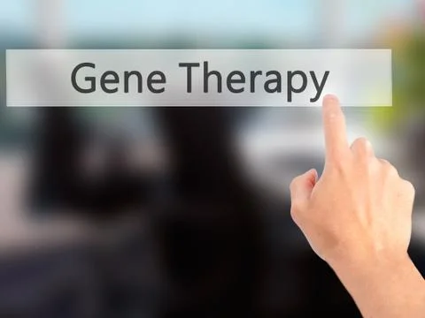 Gene Therapy - Hand pressing a button on blurred background concept on visual Foto stock