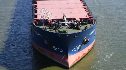 General cargo ship sails on water Stock Footage 195932799