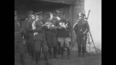 General Douglas MacArthur talking to military officers Stock Footage