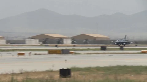General Dynamics F-16 Fighting Falcon aircraft takes off from airfield - 2016 Stock Footage 89239923
