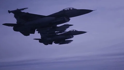 General Dynamics F-16 Fighting Falcon jets flying in formation Stock Footage 114084837
