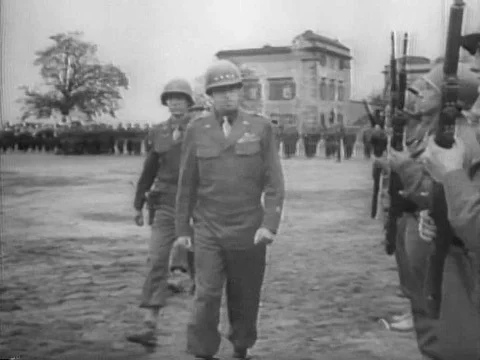 General George Smith Patton, Jr. reviews troops at a castle in Coblenz and the Stock Footage 74974950