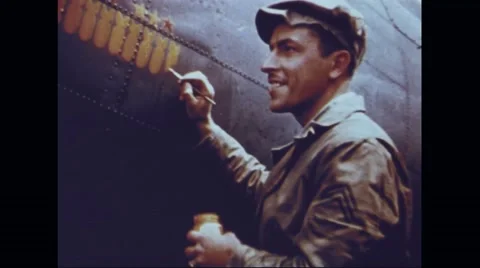 General Hansell pinning distinguished flying cross medal to crew members Stock Footage