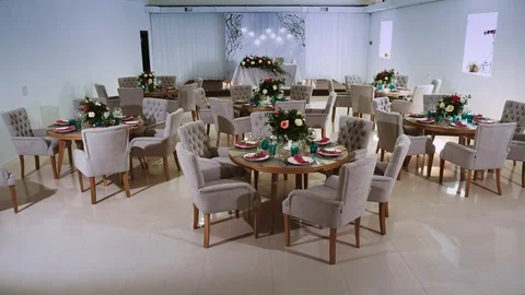 General interior plan of the restaurant with a flower decor and a honeymoon area Stock Footage 97720658