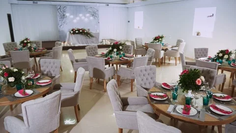 General interior plan of the restaurant with a flower decor and a honeymoon area Stock Footage 97720700
