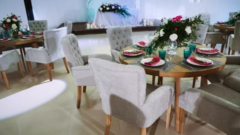 General interior plan of the restaurant with a flower decor and a honeymoon area Stock Footage 97721104