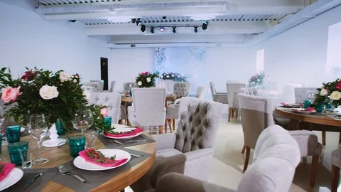 General interior plan of the restaurant with a flower decor and a honeymoon area Stock Footage 97721505