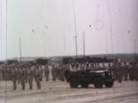 General in Jeep Driving Through And Inspecting Soldiers In A Field - Vintage 8 Stock Footage 78930630