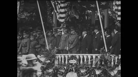 General John J Pershing saluting military soldiers Stock Footage