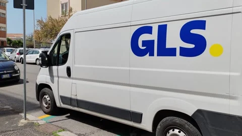 A General Logistics Systems (GLS) van parked awaiting a delivery Stock Footage 332723752