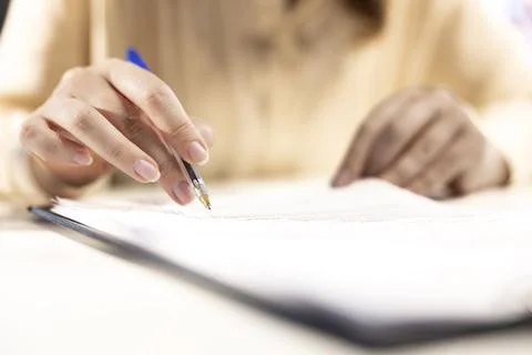 General manager examines contract terms before signing and giving authorization Stock Photos