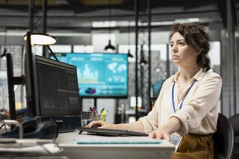 General manager leverages analytics and report writing for corporate development Stock Photos