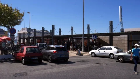 General panning of ferry terminal at Cacilhas, Almada, Portugal with restaurant Stock Footage 113293123
