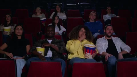 General plan of the cinema hall with spectators at the premiere, spectators are Видео 267350324