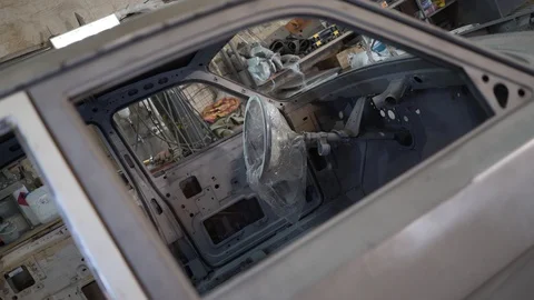 General plan of the disassembled interior of the car Stock Footage 129285495