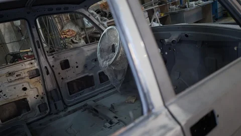 General plan of the disassembled interior of the car Stock Footage 129285505