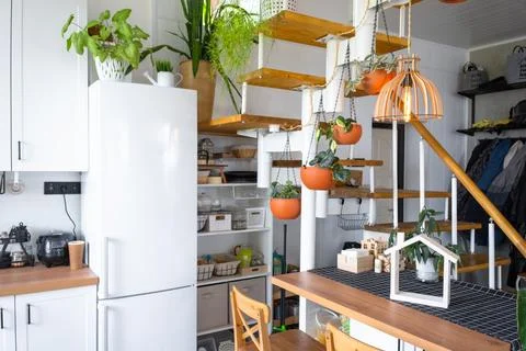 The general plan of a light white modern rustic kitchen with a modular meta.. Stock Photos