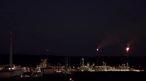 General plan for oil refinery at night where one sees the refinery all lit up Stock-Footage 56142248