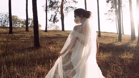 A general plan video with a beautiful young woman dressed in a white dress. Stock Footage 131766964