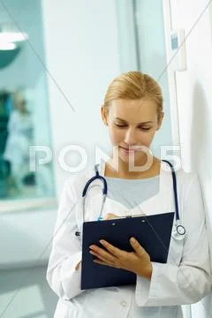 A general practitioner making notes Stock Photos