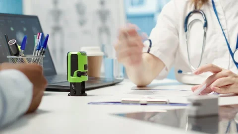 General practitioner putting his stamp on a prescription document Stock Footage 306678329