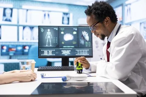 General practitioner putting his stamp on a prescription document Stock Photos