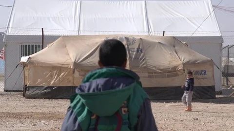A general shot of Zaatari camp on a sunny winter day Stock Footage 73728696