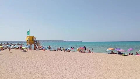 General view of the beach of Palma de Mallorca on a summer morning with tou.. Stock Footage 283178673
