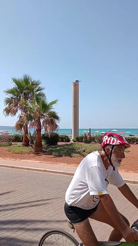General view of the beach of Palma de Mallorca with tourists on a sunny sum.. Stock Footage 286883546