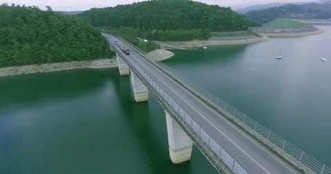 General view of the big bridge over the sea, on the back lake coast, dense Stock Footage 73644557