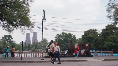 General view cdmx logo mexico city chapultepec park forest people walking Stock Footage 346612095