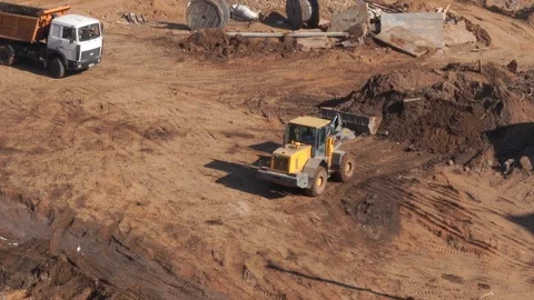 General view of the construction site of a residential area in the city - trucks Stock Footage 106531319