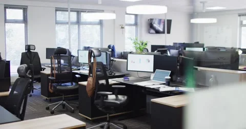 General view of empty modern office with multiple computers, slow motion Stock Footage 230326441
