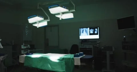 General view of empty operating room with bed and xrays in slow motion Stock Footage 342594599