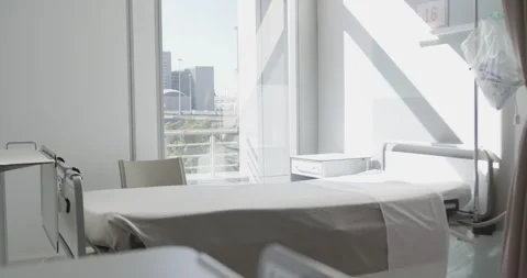 General view of empty patient room with hospital bed and big window Stock Footage 341392898