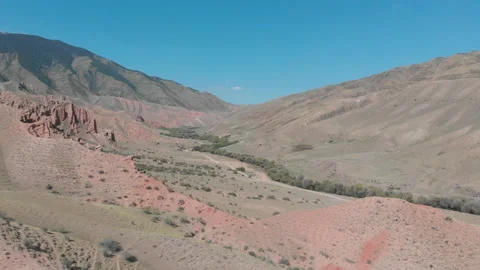 General view of the gorge and red mountains from the air Stock Footage 146330396