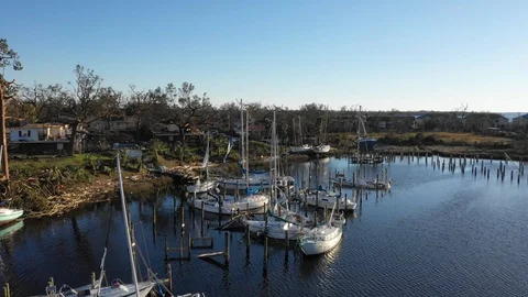 General view of harbor devastated by hurricane Michael Stock Footage 98790657