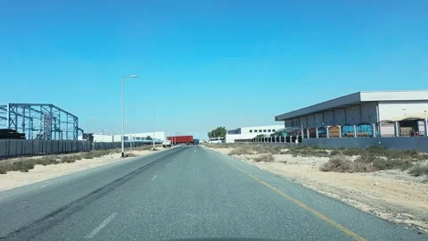 A general view of the Jebel Ali Free Zone (JAFZA) and Dubai Traders Market in Видео 331058667