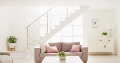 General view of living room interior with sofa and stairs Stock Footage 335682504