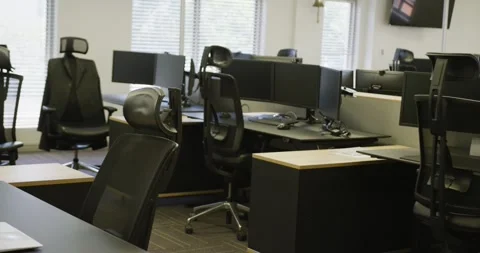 General view of modern office with desks and computers, slow motion Stock Footage 337623538