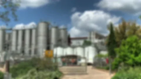 General view of a modern winery with stainless steel barrels for wine fermentati Stock Footage 146561296